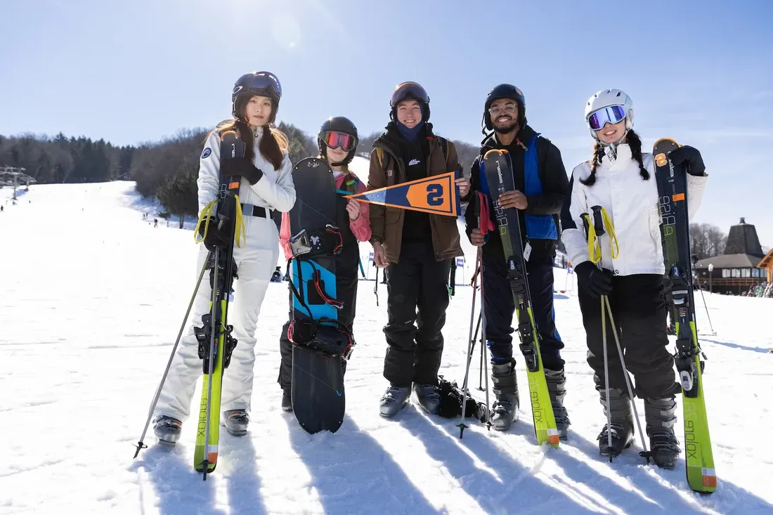 People on a ski slope.